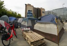 Tensions rise when businesses, homeless people share the same space Typically, when encampments are cleared, the residents just set up temporarily nearby. On Sept. 5, 2019, the residents of the L Street NE encampment moved down the block, to the foot of a new luxury apartment building. (Julia Lerner/University of Maryland)
