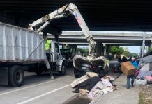 Encampment clearing raises concerns about a return to Miami’s bad old days City of Miami Department of Solid Waste Management workers use a grapple truck to remove materials from a homeless encampment in Overtown. Courts determined in 1992 that the city was criminalizing “life-sustaining activities” such as sleeping in public and placed the city under a landmark consent decree known as the Pottinger Agreement in 1998, allowing the federal judiciary to monitor the city’s treatment of its homeless population for over 20 years. The decree was lifted last year. (Nailah Summers)